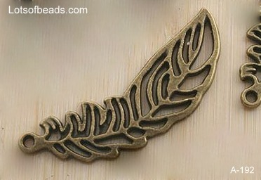 Bronze two sided filigree leaf